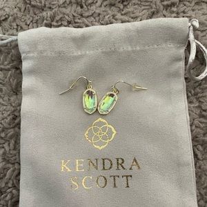 Kendra Scott gold reflective druzy earrings.